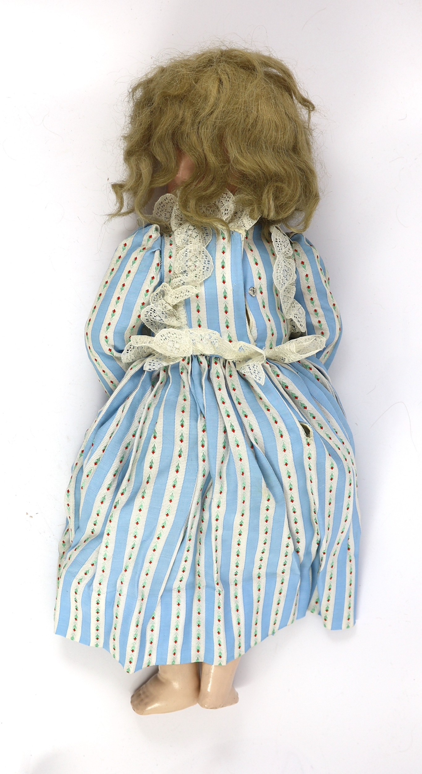 A Simon & Halbig bisque doll, German, circa 1892, 22in.